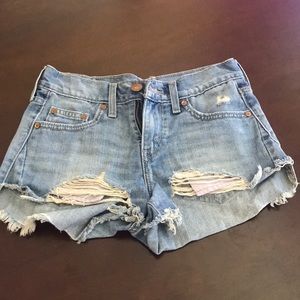 Distressed denim shorts
